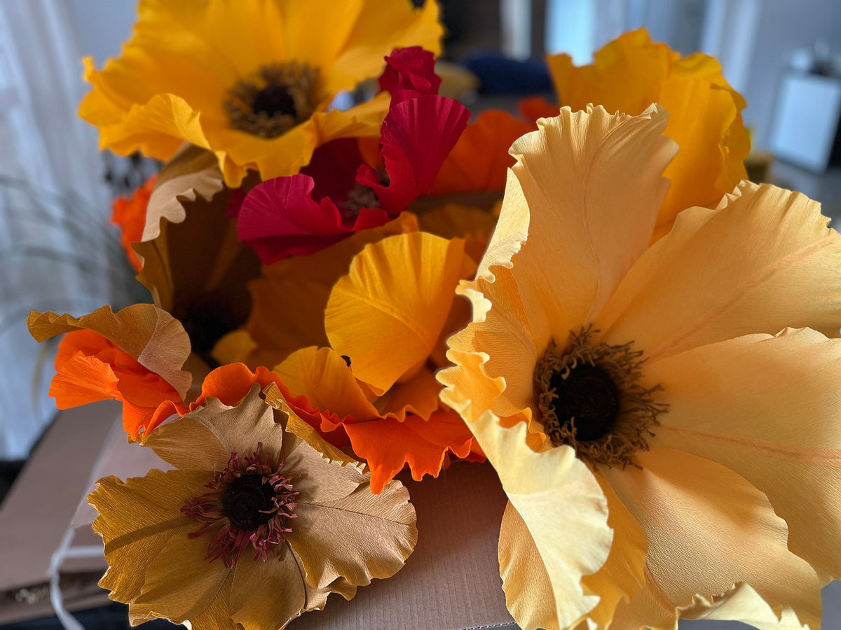 Autumn-toned giant Italian crepe paper flowers for a wedding in Spain