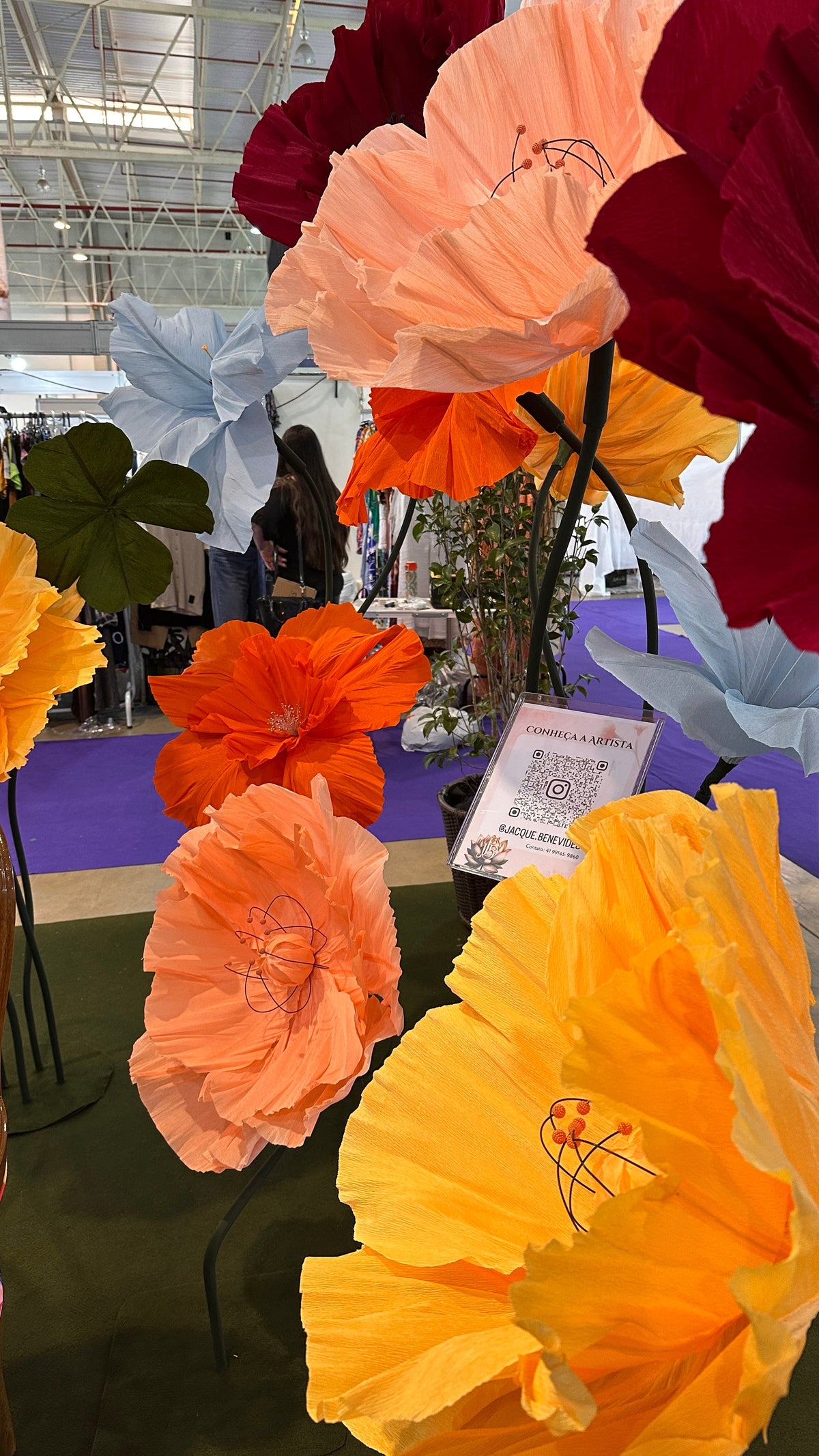 Orange, peach and burgundy giant Italian crepe paper flowers - Pequeno Príncipe Hospital booth