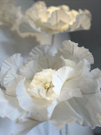 Aerial floral installation in Italian crepe paper suspended from the ceiling at Simoni Perfumaria - overview
