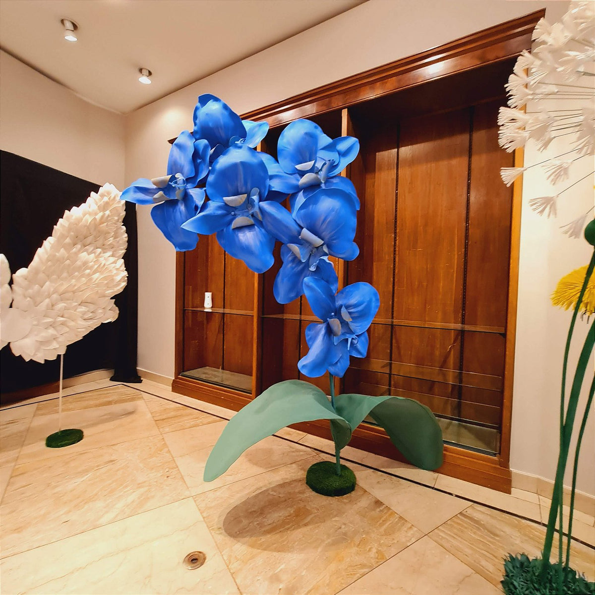 Close-up of the hand-shaping process for the giant petals