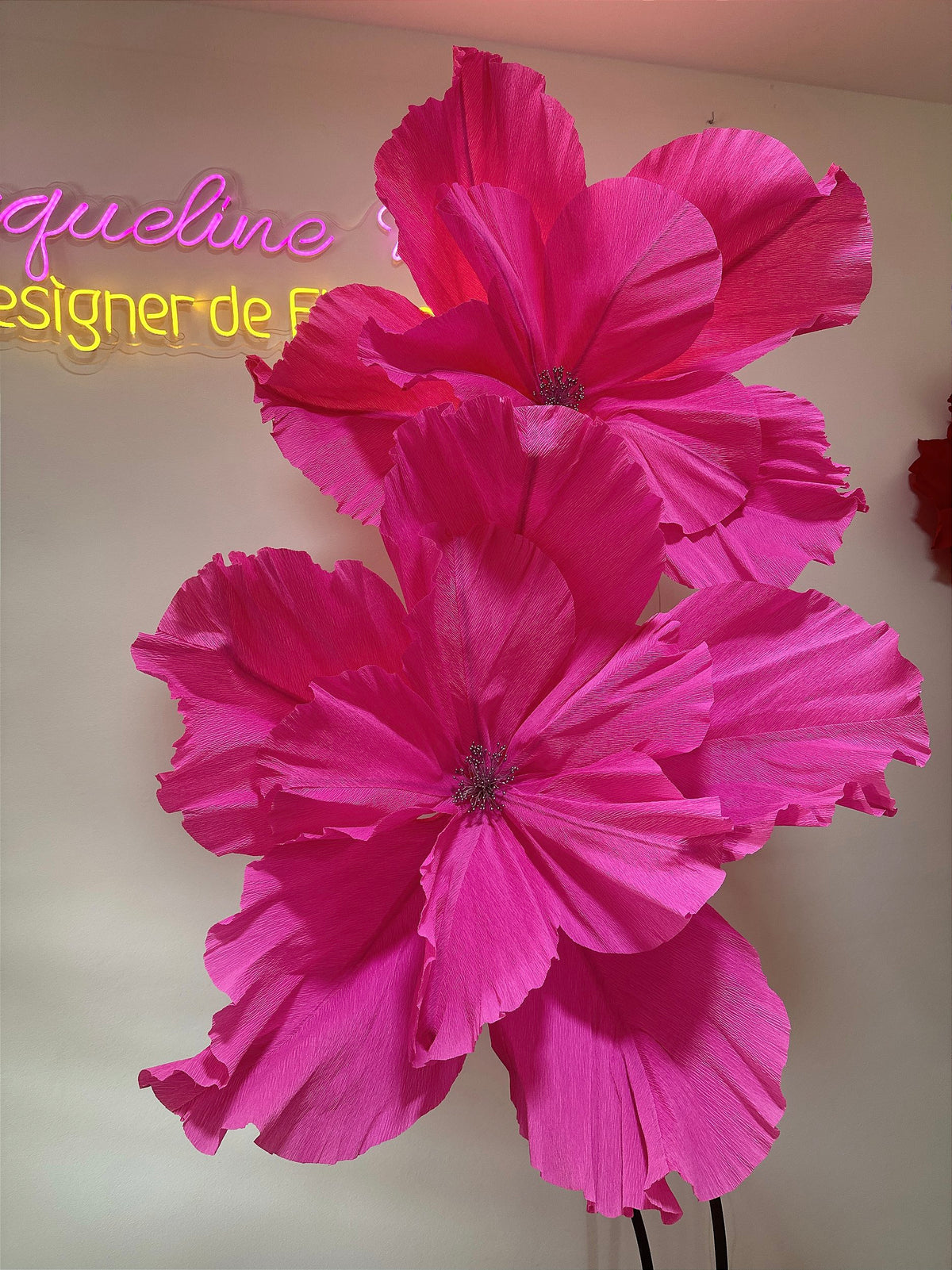 Giant Italian crepe paper flower styled into a decorative scene
