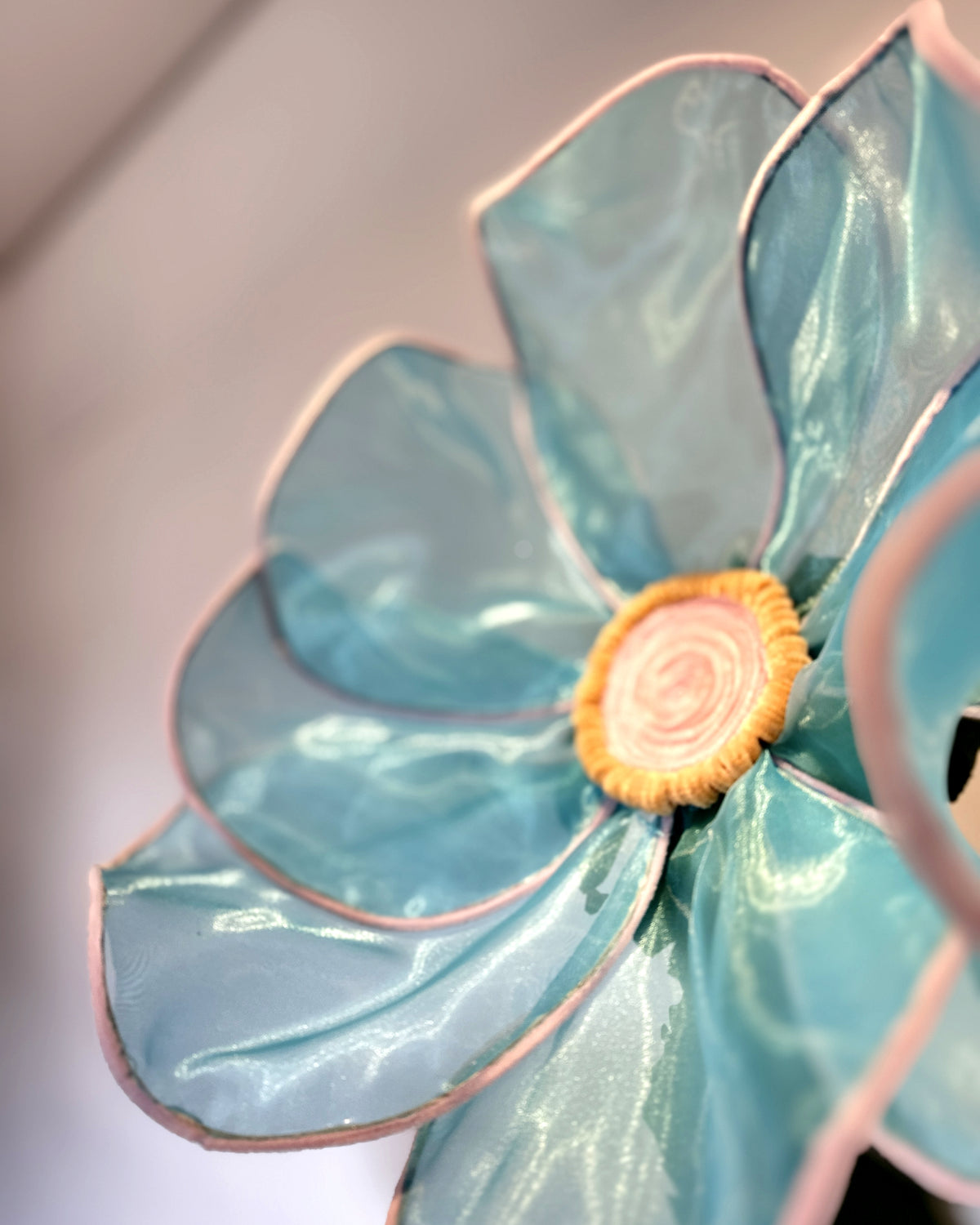 Giant blue organza flowers, side view