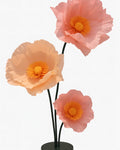 Fleurs géantes en papier crépon rosé à étamines