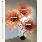 Dimensions : Fleurs géantes en organza orange nervurées