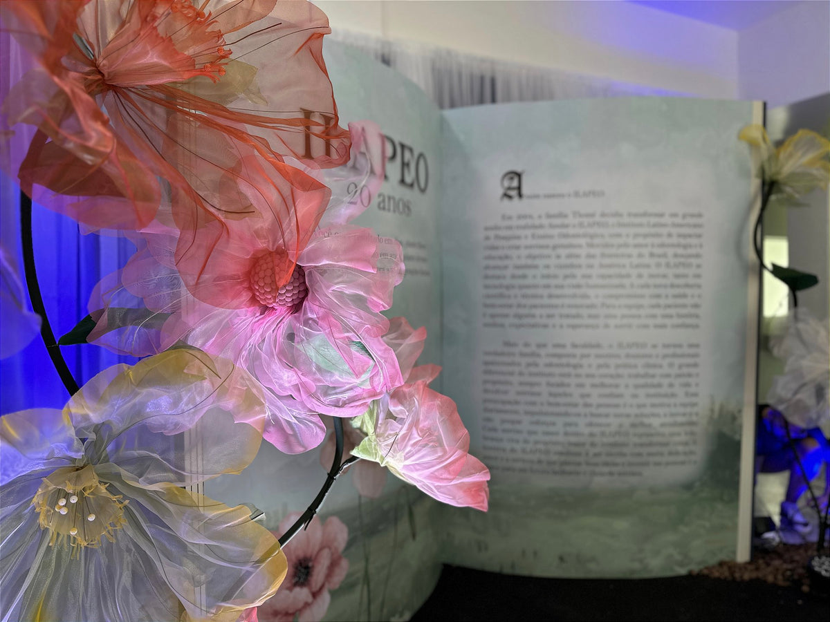 Overview of the reception space decorated with illuminated giant flowers