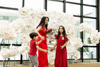 Overview of the exhibition with multiple floral compositions in the atrium