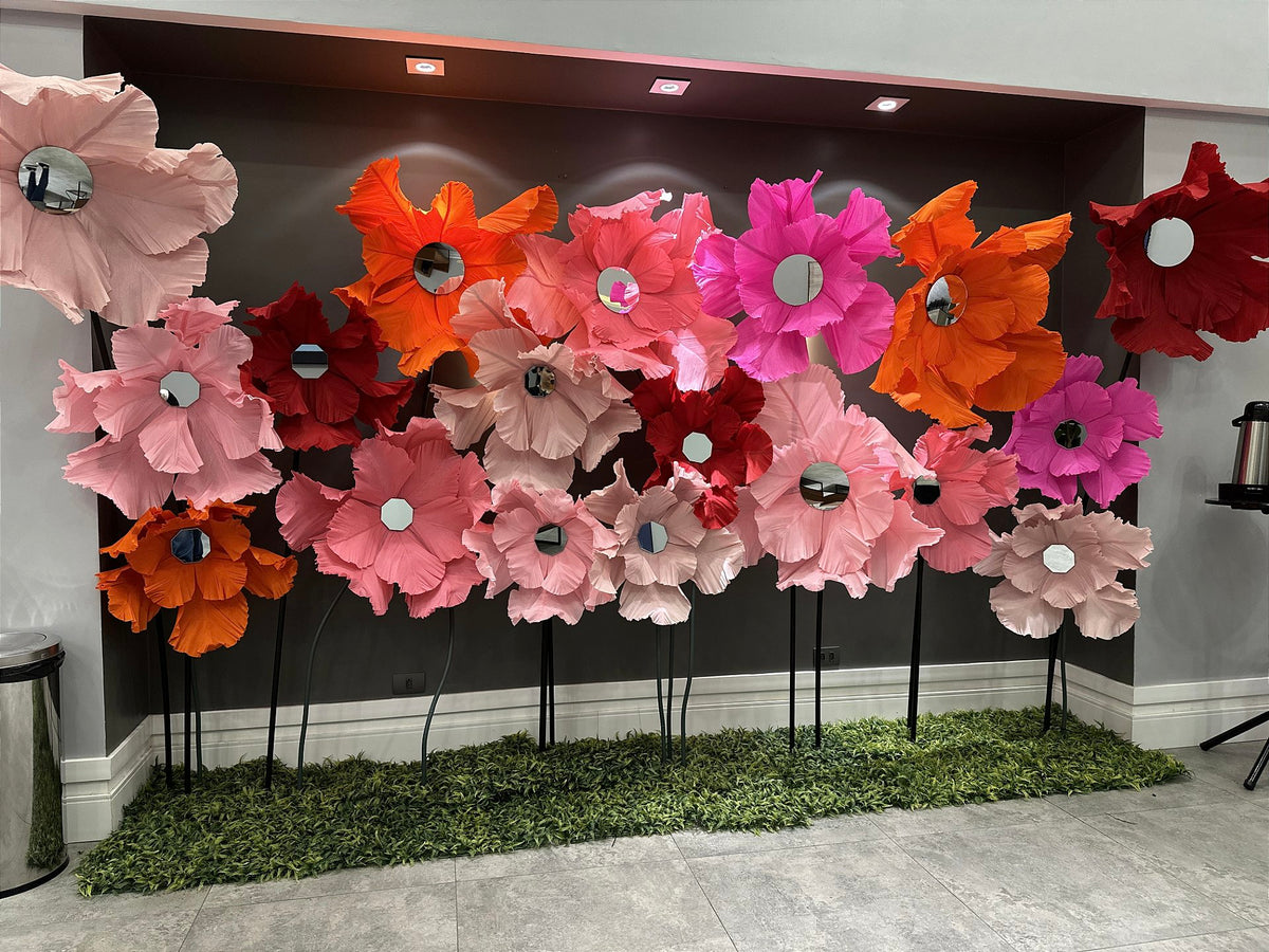 Organza butterflies suspended among the giant flowers - installation detail