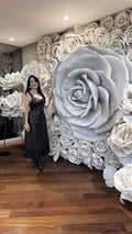 Panel of giant white roses in 3D depth - TJPR philanthropic event