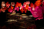 Floral installation in warm tones at Clube Curitibano - Sweet 15 celebration overview