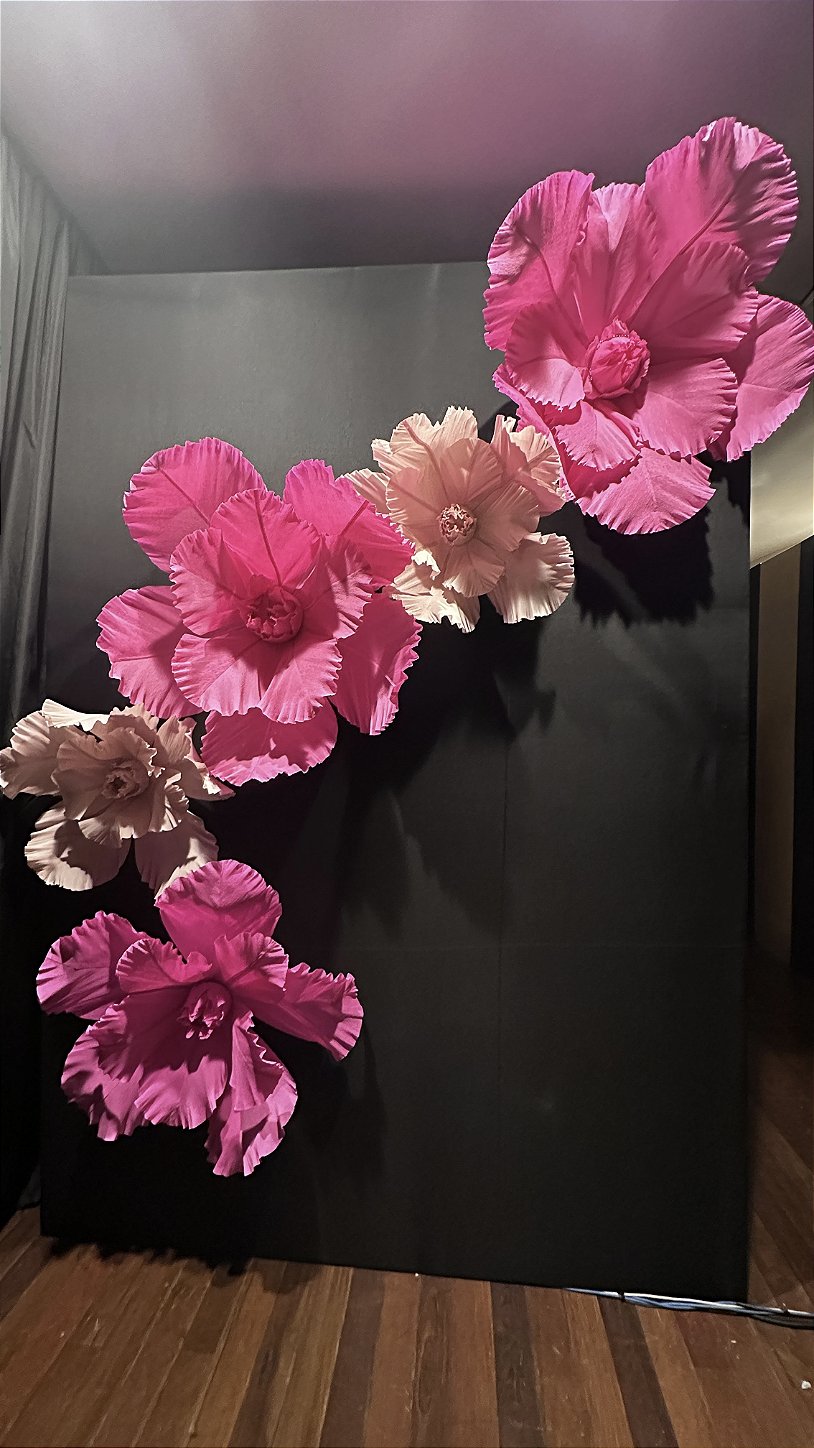Giant Italian crepe paper flower with stage lighting highlighting its texture