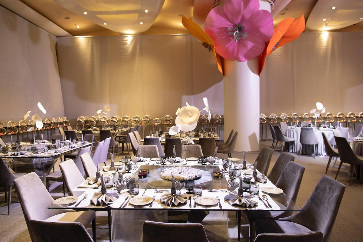 Suspended garden with 45 giant EVA foam flowers on the main hall ceiling - royal wedding in Riyadh
