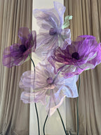 Close-up of illuminated organza's translucent texture - gala floral installation
