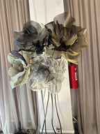 Sinuous stems with organza flowers at varying heights - institutional floral installation