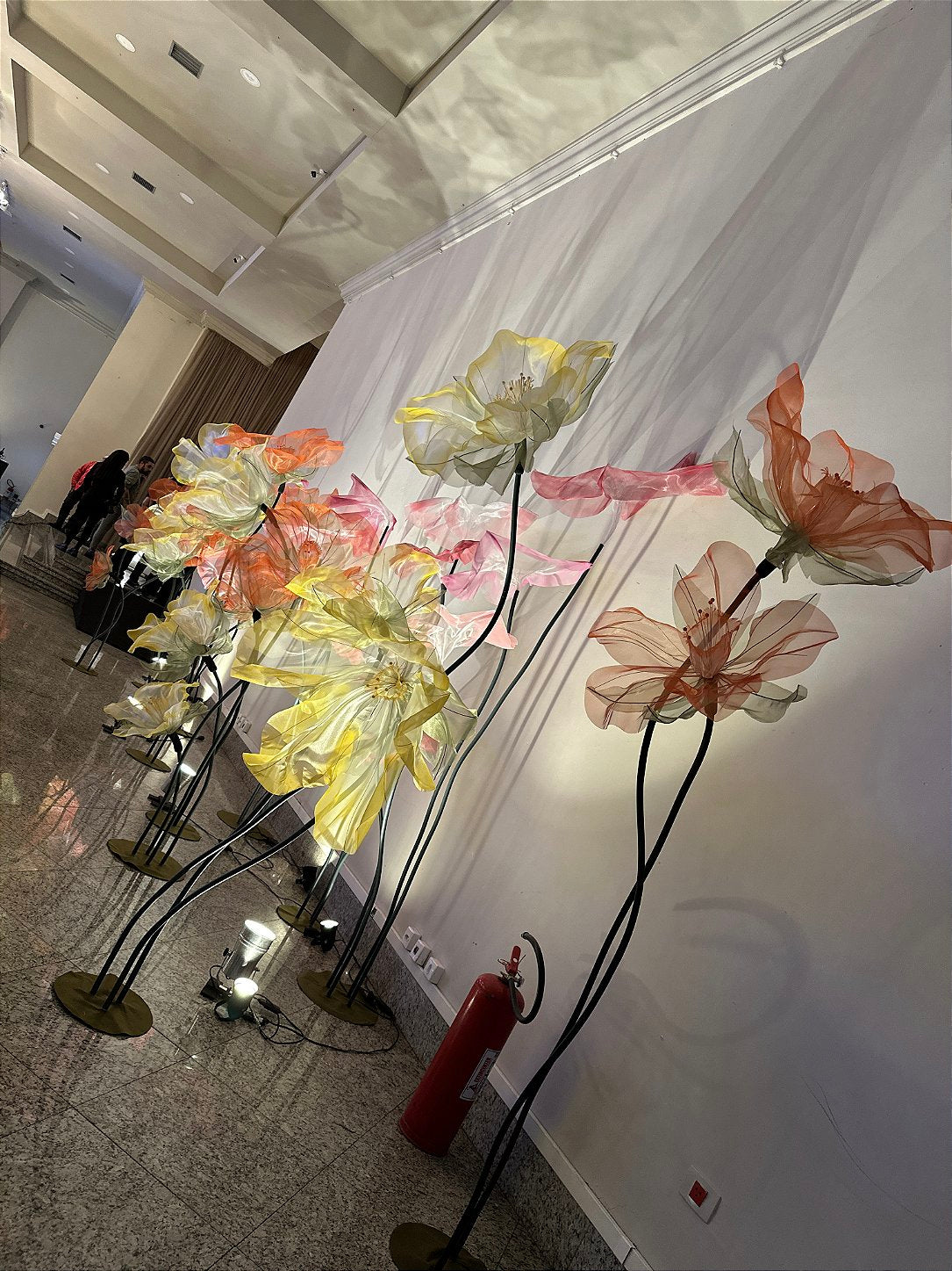 Side view of the immersive organza floral installation