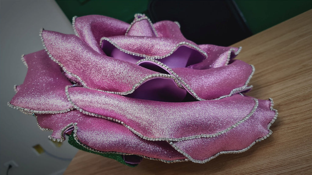 Intense shimmer texture on the giant rose's petal