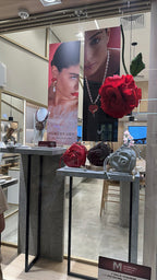 Giant red rose in Italian crepe paper at the Maria Dolores jewelry storefront