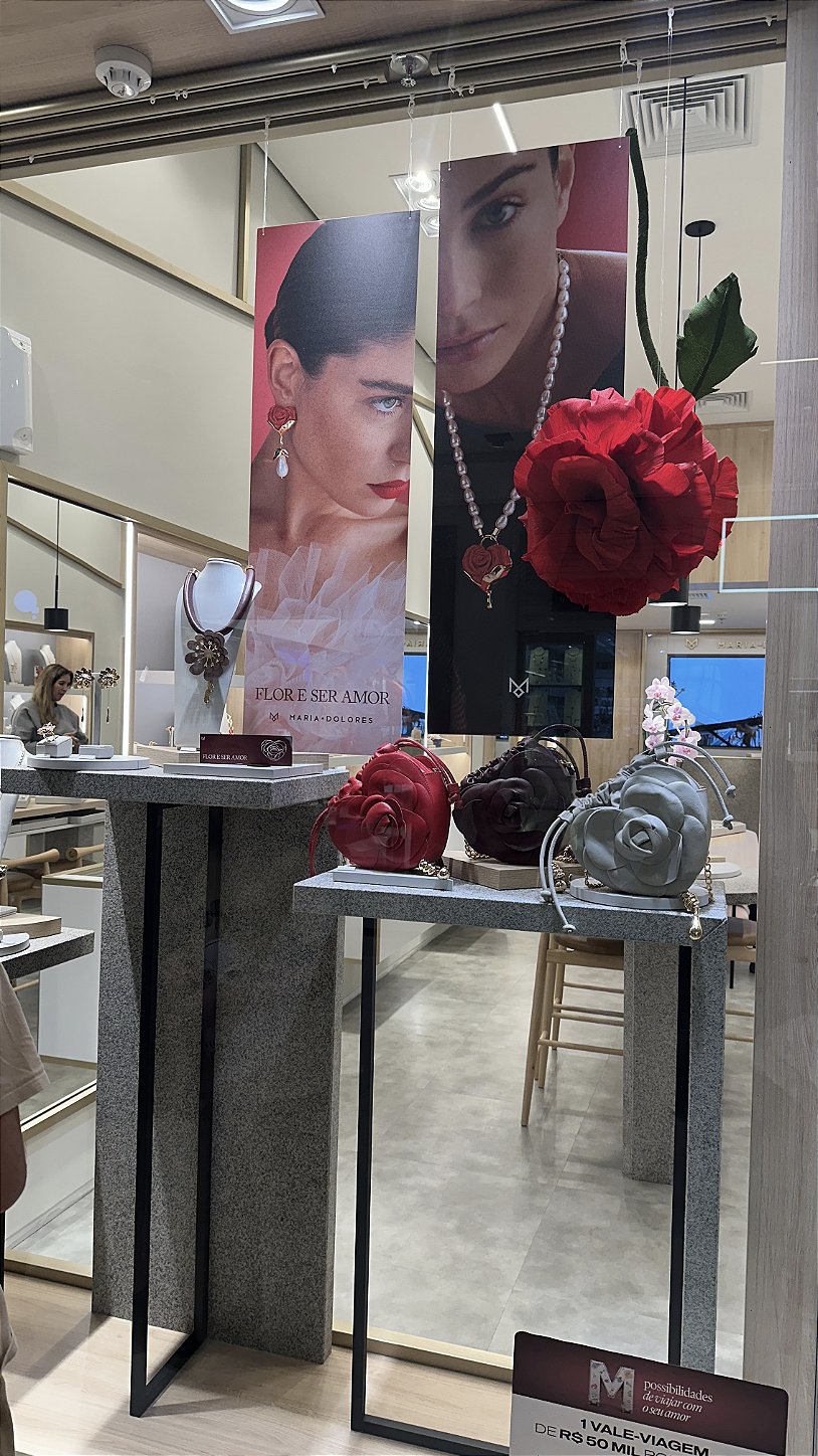 Giant red rose in Italian crepe paper at the Maria Dolores jewelry storefront